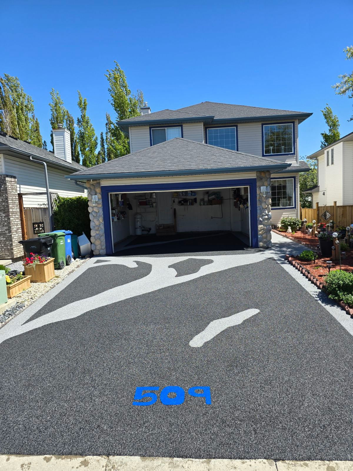 Custom graphic driveway with house